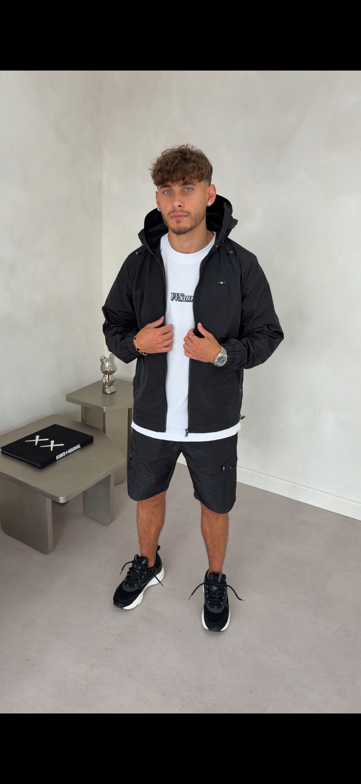 White Tee Black Tagged Logo